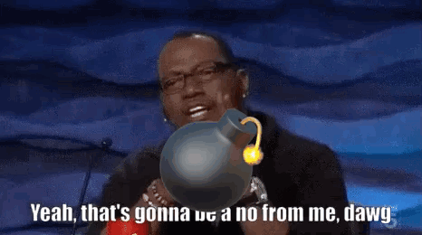 A Man Is Holding A Bomb And Saying Yeah That 'S Gonna Us A No From Me Dawg . GIF