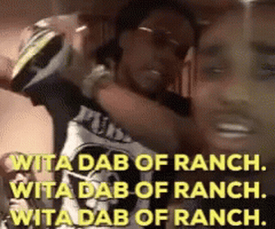 A Man Is Holding A Bottle Of Beer And Says ' Rita Dab Of Ranch ' On It . GIF