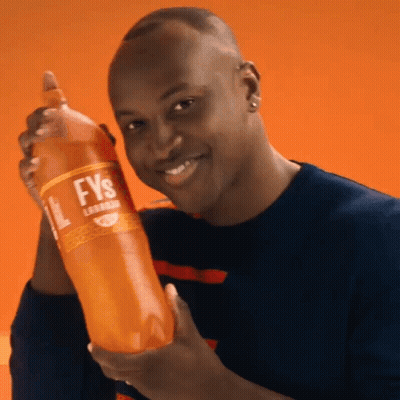 A Man Is Holding A Bottle Of Fys GIF