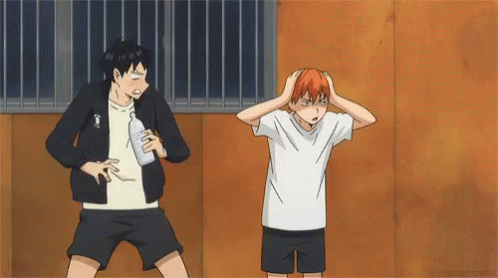 A Man Is Holding A Bottle Of Water And Another Man Is Holding A Ball . GIF