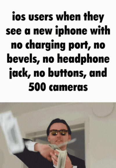 A Man Is Holding A Bunch Of Money In Front Of A Sign That Says Ios Users When They See A New Iphone With GIF