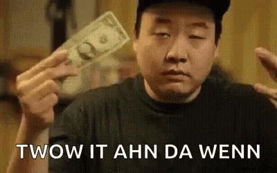 A Man Is Holding A Bunch Of Money In His Hands And Saying Twow It Ahn Da Wenn . GIF