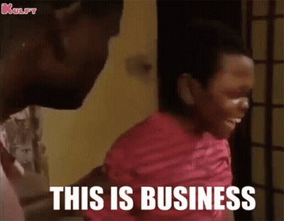 A Man Is Holding A Child Who Is Laughing And Says This Is Business GIF