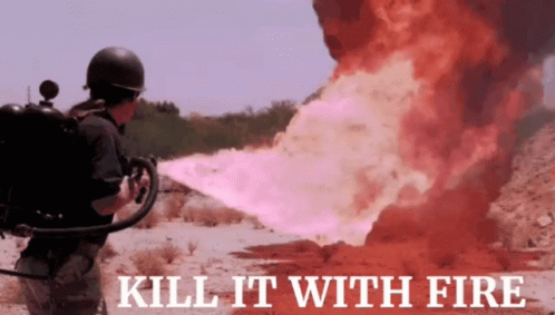 A Man Is Holding A Fire Extinguisher With The Words Kill It With Fire Written Below Him GIF