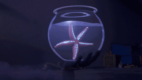 A Man Is Holding A Fish Bowl With A Starfish In It And The Words " My Quest Was Darkly Bountiful " GIF