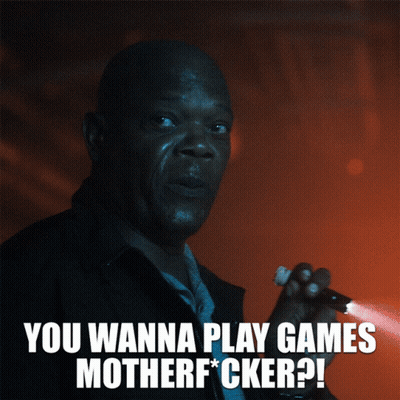 A Man Is Holding A Flashlight And Says " You Wanna Play Games Motherf*cker " GIF