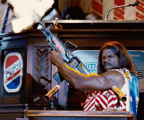 A Man Is Holding A Gun In Front Of A Pepsi Logo GIF