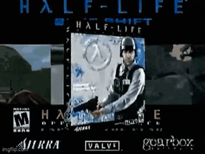 A Man Is Holding A Gun In Front Of A Screen That Says Half-Life GIF