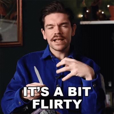 A Man Is Holding A Knife And Says It 'S A Bit Flirty GIF