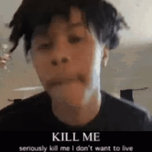 A Man Is Holding A Knife In His Mouth And Making A Face . GIF