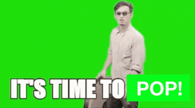 A Man Is Holding A Large Clock With The Words It 'S Time To Pop GIF