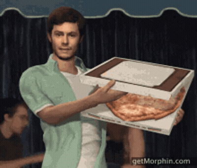 A Man Is Holding A Large Pizza In A Box GIF