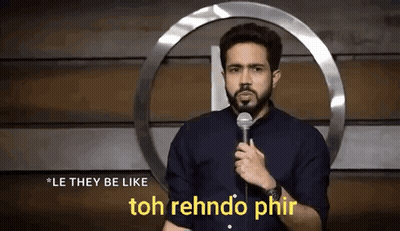 A Man Is Holding A Microphone And Saying `` Le They Be Like Toh Rehndo Phir '' . GIF