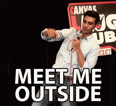 A Man Is Holding A Microphone And Saying " Meet Me Outside " GIF