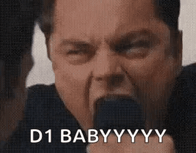 A Man Is Holding A Microphone In His Mouth And Saying `` D1 Baby Yyy '' . GIF