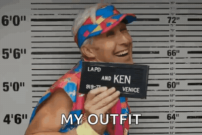 A Man Is Holding A Mugshot In Front Of A Police Line Up And Saying `` My Outfit '' . GIF