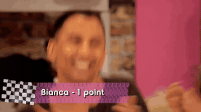 A Man Is Holding A Piece Of Paper That Says Bianca 1 Point GIF