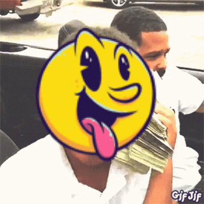 A Man Is Holding A Pile Of Money With A Pac Man Face Behind Him GIF