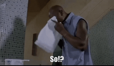 A Man Is Holding A Pillow Over His Face And Says `` So ? '' GIF