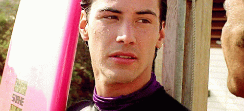 A Man Is Holding A Pink Surfboard That Says Surfe On It GIF