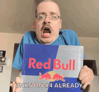 A Man Is Holding A Red Bull Sign And Says " Unks On # 4 Already " GIF
