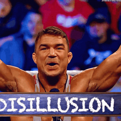 A Man Is Holding A Sign That Says Disillusion On It GIF