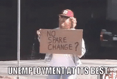A Man Is Holding A Sign That Says No Spare Change ? Unemployment At Its Best . GIF