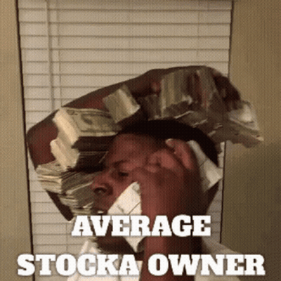 A Man Is Holding A Stack Of Money On His Head And Talking On A Cell Phone GIF