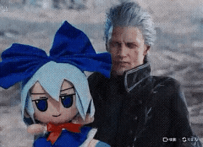 A Man Is Holding A Stuffed Doll With Blue Hair And A Bow . GIF