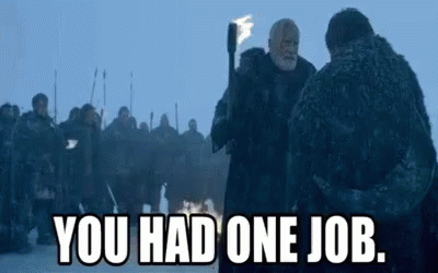 A Man Is Holding A Torch In Front Of A Crowd Of People And Saying `` You Had One Job '' . GIF