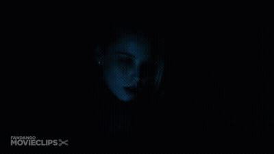 A Man Is Holding A Woman 'S Face In A Movie Clip GIF