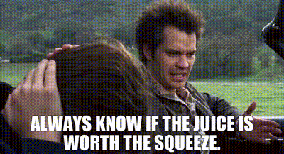 A Man Is Holding A Woman 'S Head While A Woman Looks On . GIF