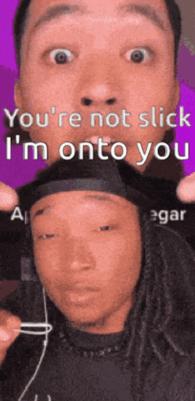 A Man Is Holding Another Man 'S Head With The Words You 'Re Not Slick I 'M Onto You On The Bottom GIF