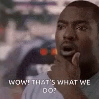 A Man Is Holding His Hand To His Chin And Making A Surprised Face . GIF