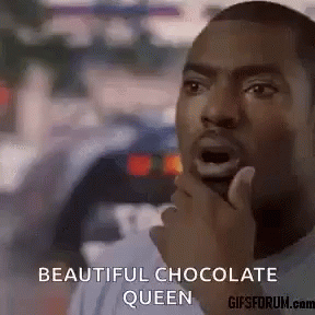 A Man Is Holding His Hand To His Chin And Says " Beautiful Chocolate Queen " GIF