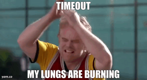 A Man Is Holding His Head With His Hands While Making A Funny Face And A Meme . GIF