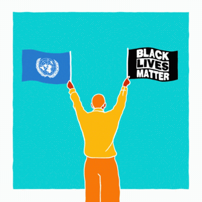A Man Is Holding Up Two Flags And A Sign That Says Black Lives Matter GIF