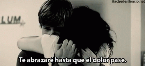 A Man Is Hugging A Woman With The Words Te Abrazare Hasta Que El Dolor Pase GIF