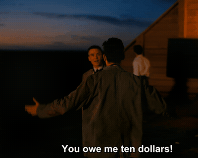 A Man Is Hugging Another Man With The Words You Owe Me Ten Dollars Below Him GIF