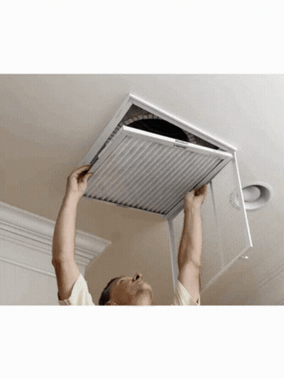 A Man Is Installing A Filter On A Ceiling That Says Emerson GIF