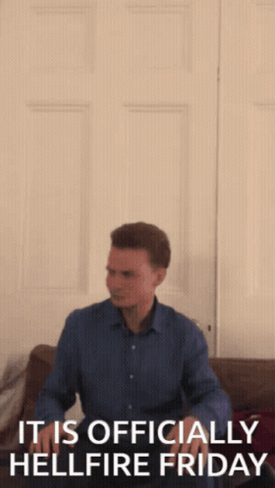 A Man Is Jumping In The Air With The Words " It Is Officially Hellfire Friday " Behind Him GIF