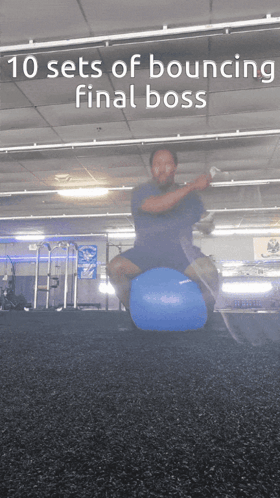 A Man Is Jumping On A Blue Ball In A Gym With The Words 10 Sets Of Bouncing Final Boss Above Him GIF