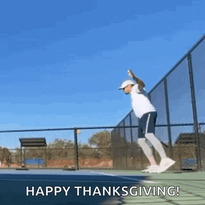 A Man Is Jumping On A Tennis Court With The Words Happy Thanksgiving Written Below Him GIF