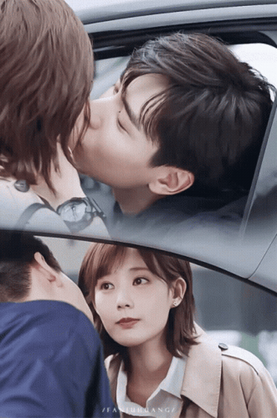 A Man Is Kissing A Woman On The Cheek In A Car While A Woman Looks On GIF