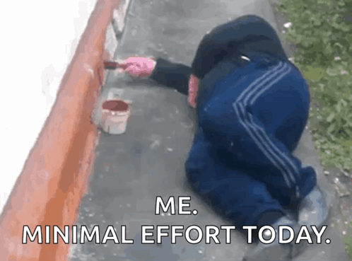 A Man Is Kneeling Down And Painting A Wall With The Words Me Minimal Effort Today Below Him GIF