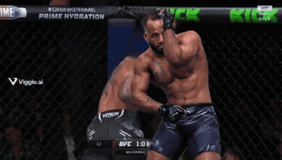 A Man Is Kneeling Down In A Cage With The Time Of 0:59 On The Screen GIF