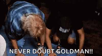 A Man Is Kneeling Down With The Words Never Doubt Goldman Written On The Bottom GIF