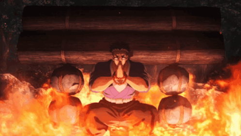A Man Is Kneeling In Front Of A Fire With His Hands Folded GIF
