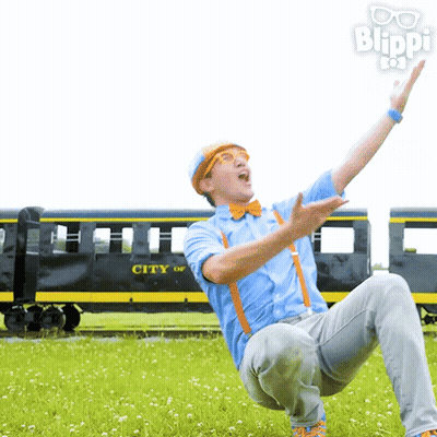 A Man Is Kneeling In Front Of A Train That Says City On It GIF
