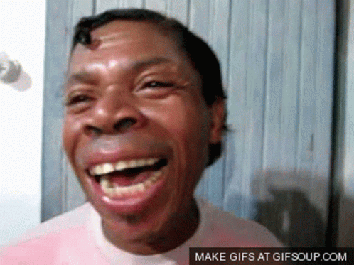 A Man Is Laughing With A Make Gifs At Gifsoup.com Link Below Him GIF